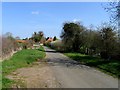 Stoke Road approaches Lyddington in Lyddington
