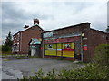 Derelict shop on Coppice Road, Hockley in SK12 1SL