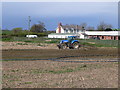 Muck spreading on maize stubble near Dol Afon Farm in LL17 0HT
