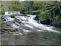 Weir and cascades on the Lower Clydach River at Forge Fach in SA6 5YL