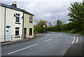 A bus stop on the corner of Tempest Road Chew Moor in BL6 4HQ