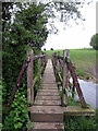 Footbridge on the path to the playing fields in MK19 6JS