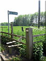 Stile and waymarker in Little Linford Lane in MK19 7EB