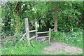 Stile into Mill Lane in GL54 4EP