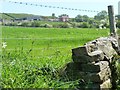 View across farmland towards Shaw Walls Farm in ST10 2HU