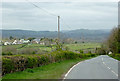 The A4081 descending towards Llandrindod Wells, Powys in Llanyre Community
