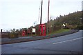 Postbox, notice board and phonebox by the B4293 at Itton Common. in NP16 6BZ
