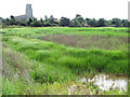 View towards Holy Trinity church from the River Blyth in IP19 9LP