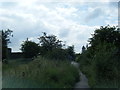 Path meets Lea Manor Farm entrance drive in Lea-by-Backford