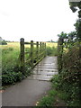 Footbridge taking the Grafton Way over Silverstone Brook in NN12 6JD