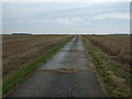 Concrete farm track off Rogues Lane in CB23 3UQ