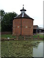 Pond and dovecote, Manor Farm in SG2 7NX