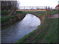 Footbridge over the River Foss at Earswick Village, York in YO32 3NS