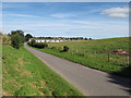 The road to Mayne Farm looking back towards Fairfield Avenue in IV30 1YF