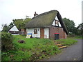 Small thatched cottage on Wellington Road near Church Aston in TF10 9LW