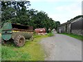 Agricultural equipment and an old barn in CA7 0EA