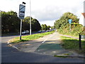 St Albans Road at the junction of Coates Way in WD25 9NE