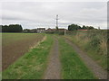 Farm track with bridleway status leading to the farmyard at Fardeneside Farm in TS15 9PX