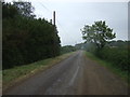 Farm road heading east in PE6 7TJ