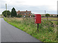 Post box on the road at Buscot Wick in SN7 8DJ