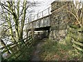 Disused railway bridge over River Aire in LS18 4GP