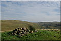 Hilltop cairn east of Cauld Rocks in KA30 8HD