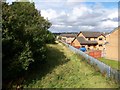Houses backing onto the disused rail track at Newmains in ML2 9DU