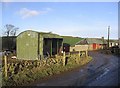 Farm road and buildings at Over Langshaw in TD1 2PE