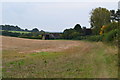 View across field towards Woodgate Farmhouse in SP5 1RH