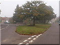 Triangular grass traffic island in Yardley Hastings