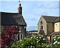 Cottages at Low Stubbin with view to Hoober Stand in S62 7NS