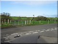 Road junction and footpath across farmland. in CT3 1RQ