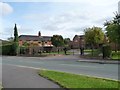 Contrasting houses on Main Road, Anslow in DE13 9QH