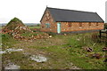 Farm building and rubble in LU7 0DW