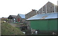 Converted farm buildings at Tyddyn Mawr in LL55 4PG