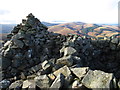 Cairn and shelter on Hare Law summit in Kirknewton