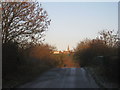 Former railway bridge and Coleby church in LN5 0AH
