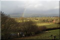 The aspect from Cross Keys with rainbow in SY17 5AF