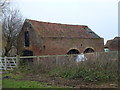 Unusual design of old brick barn in PE14 9QF