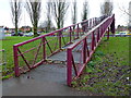 Purple footbridge over the A38 in GL4 0NU