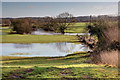 Slightly flooded fields beside the River Avon in SN12 7QA