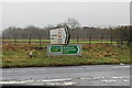 Sign Posts at Low Woodnook A595 in CA7 1AR