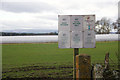 Signs beside polytunnels at Blairgowrie in PH10 6LR