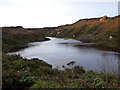 Pool in the china clay pit on Tredinney Common in TR19 6HX