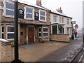 Empty pub and Fish & Chip shop in Woodford in NN14 3AL