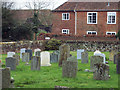 St Andrew's Churchyard and Lower Nunton Farm House in SP5 4HP