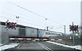 Train passing Stubton Road Level Crossing, Claypole in NG23 5BJ