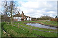 Pond and Oast House on Dairy Lane in TN12 9ST
