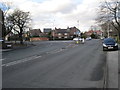 Ack Lane West, junction with Church Road in SK8 7QE