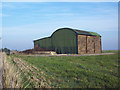 A barn full of straw at Tottons Down Barn in SP5 4NS